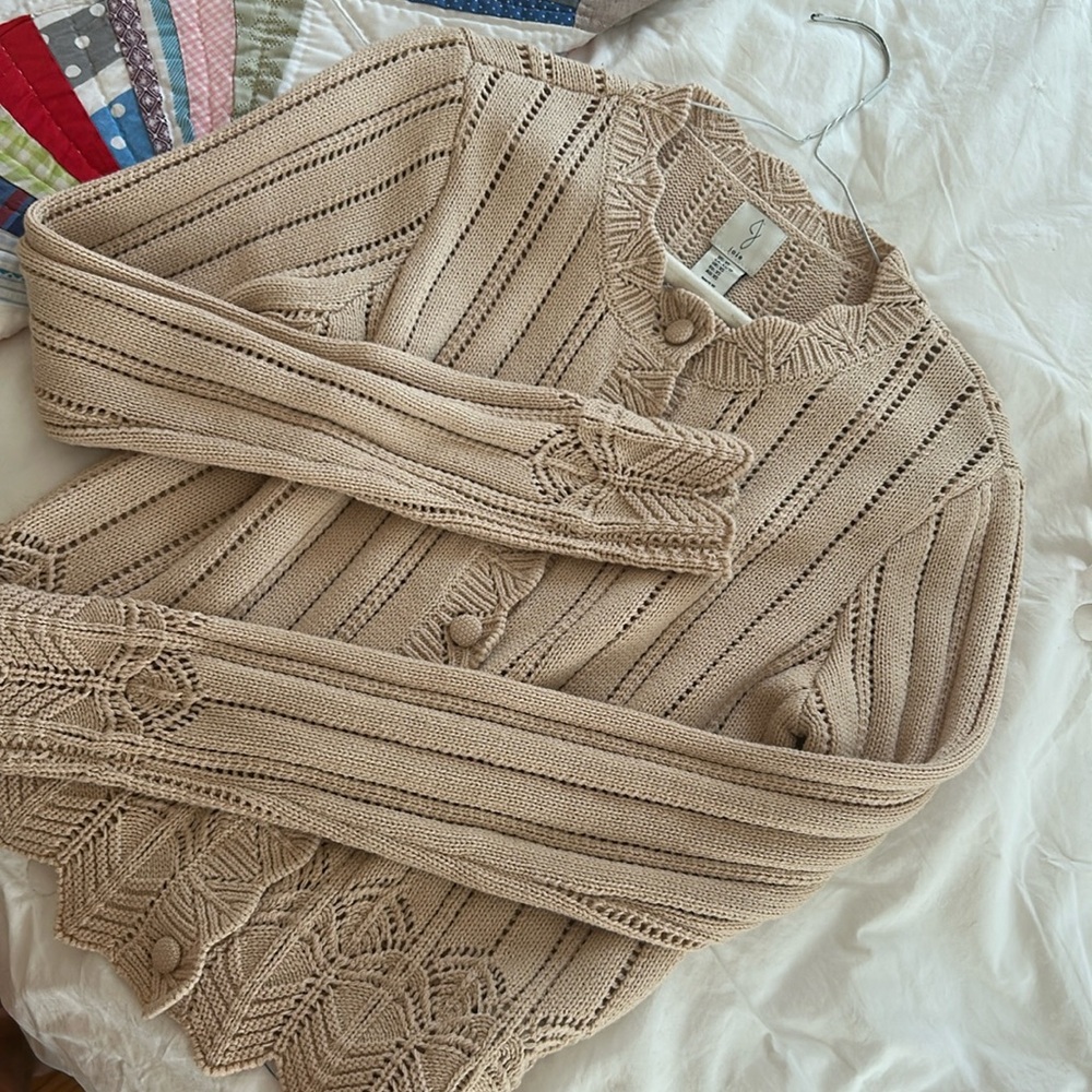 Cream/tan  color sweater with extra long sleeve
